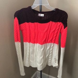 Sweater has a little whole on the side